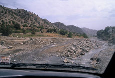 The final miles to Moussem of Imilchil require driving through a river bed
