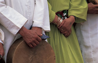 hands holding a drum