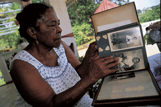 woman holding a family photo album